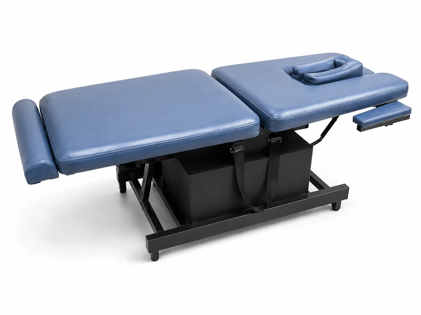Padded motorised traction table with support straps and face cradle